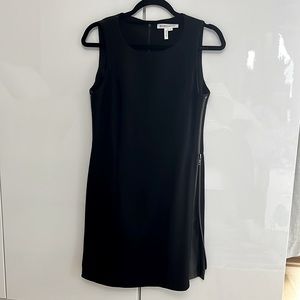 BCBGeneration size 8 black dress w/ zipper & vegan leather details on sides